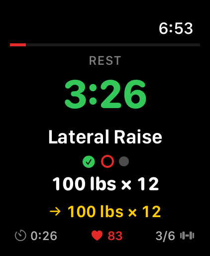 GymPsycho on Apple Watch during a rest pause: green rest timer at 3:26, Lateral Raise, set dots, the working set 100 lbs times 12, the coach line below it, and a footer with duration, heart rate 83 and exercise 3 of 6