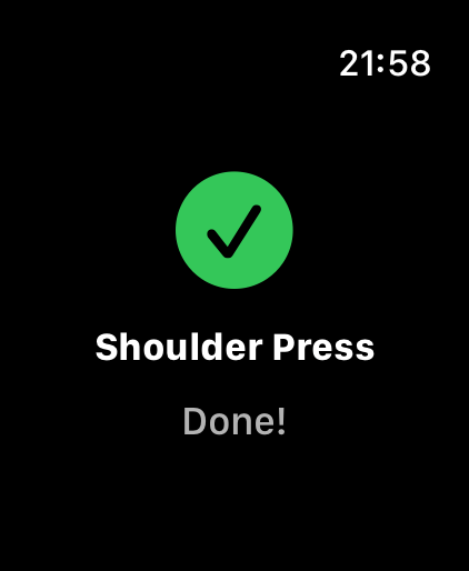 Exercise completed on Apple Watch: green checkmark, Shoulder Press, Done